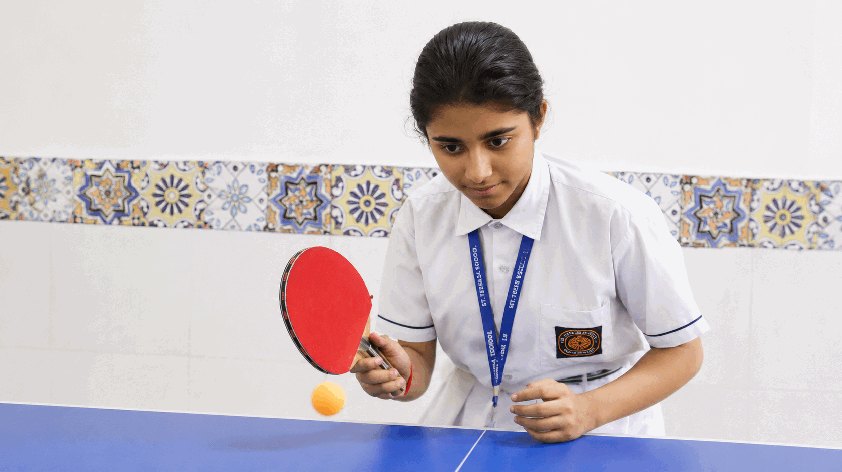 Student playing table tennis