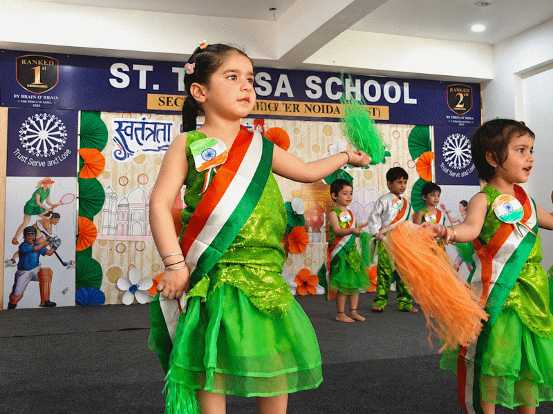 Students performing on stage at St. Teresa School