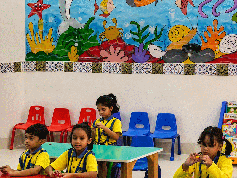 Students working together in a classroom at St. Teresa School